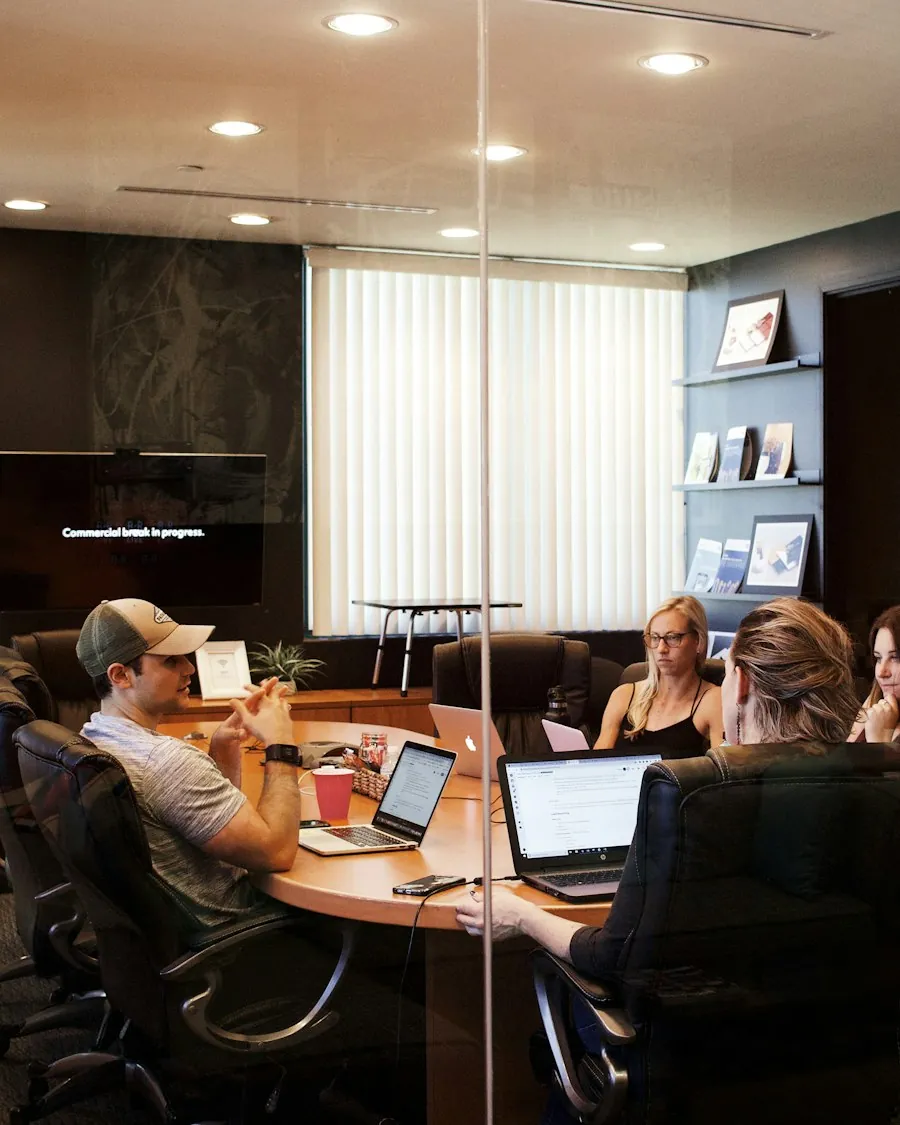 QA consultants discussing test strategy with a product team